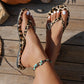 Flip-flops med leopardmønster og hjerteanheng